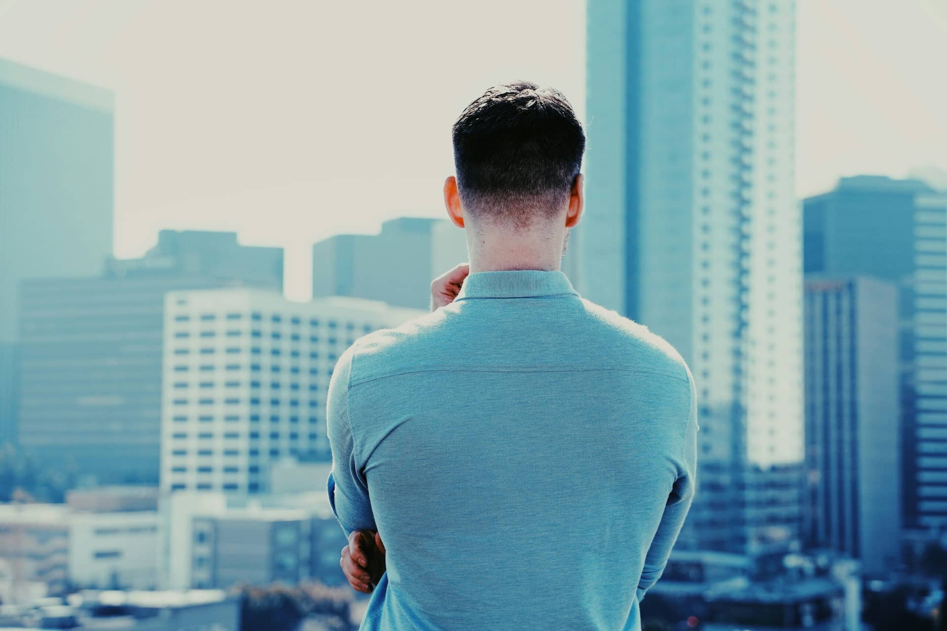 Aerial view of a modern city skyline at sunset